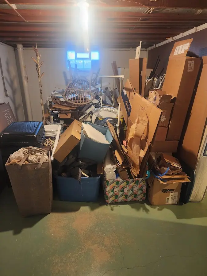 Roll-off dumpster container at job site for 8 Yard Dumpster Rental in Blue Springs